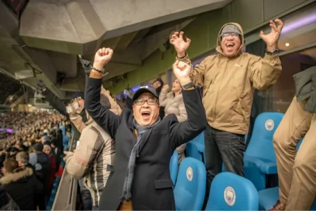Hard Work Pays, Qnet’s Achievers Are The Proof! 9 2 people cheering at a football game