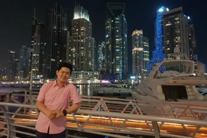 Michael Dovinno in front of city