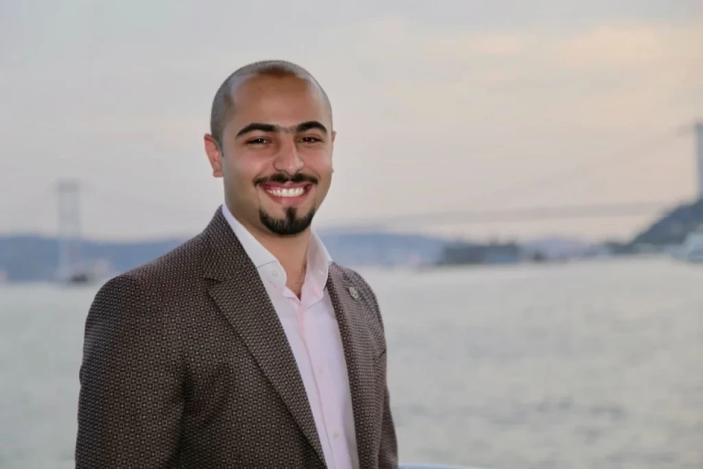 Mustafa Negm in an ocean background