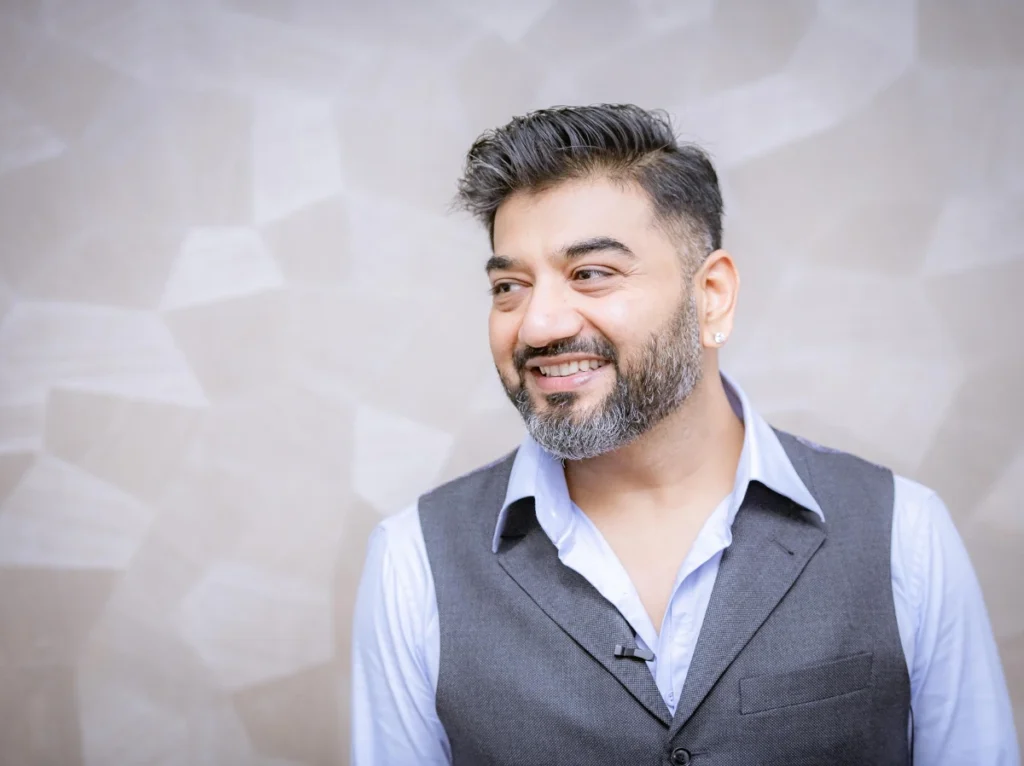 sachin gupta smiling