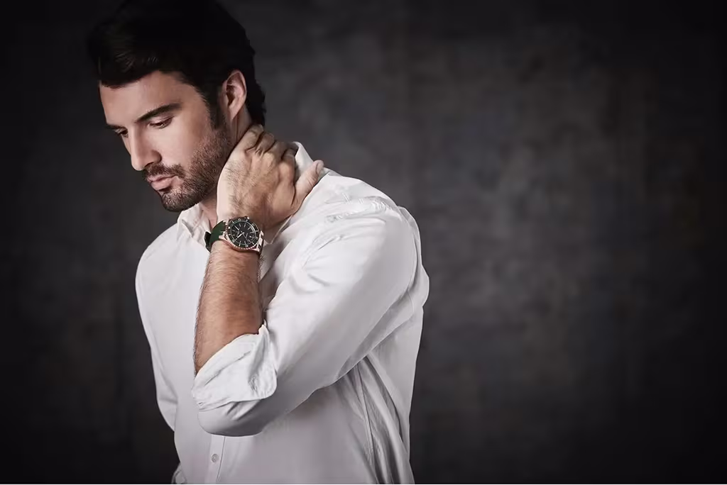 5 Things Your Bernhard H. Mayer Swiss Watch Says About You 3 Man wearing Bernard h mayer watch in white shirt