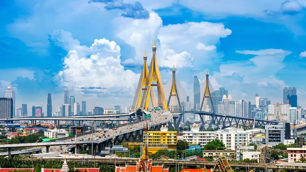 Travel Right: Tips For Making Your Next Holiday An Eco-Friendly One 2 Skyline image of bangkok bridge