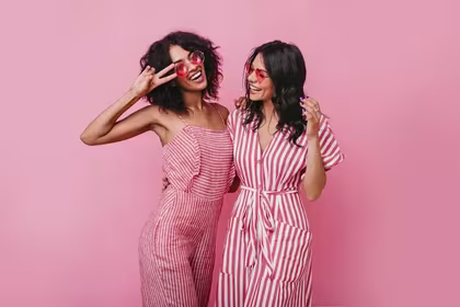 Lessons from Barbie - Two girls in pink having a good time