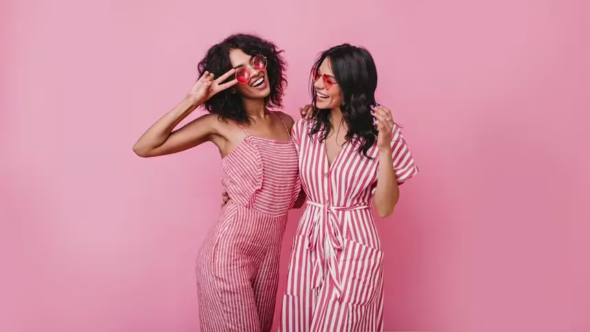 Lessons from Barbie - Two girls in pink having a good time