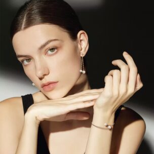 The Timeless Elegance Of Akoya Pearls And Why They’re So Enchanting 4 Woman wearing Greta Earrings and Greta Bangle from the Bernhard H. Mayer Pearl Icons Collection