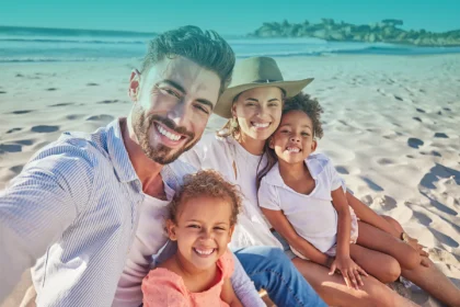 Family at the beach qvi vacay