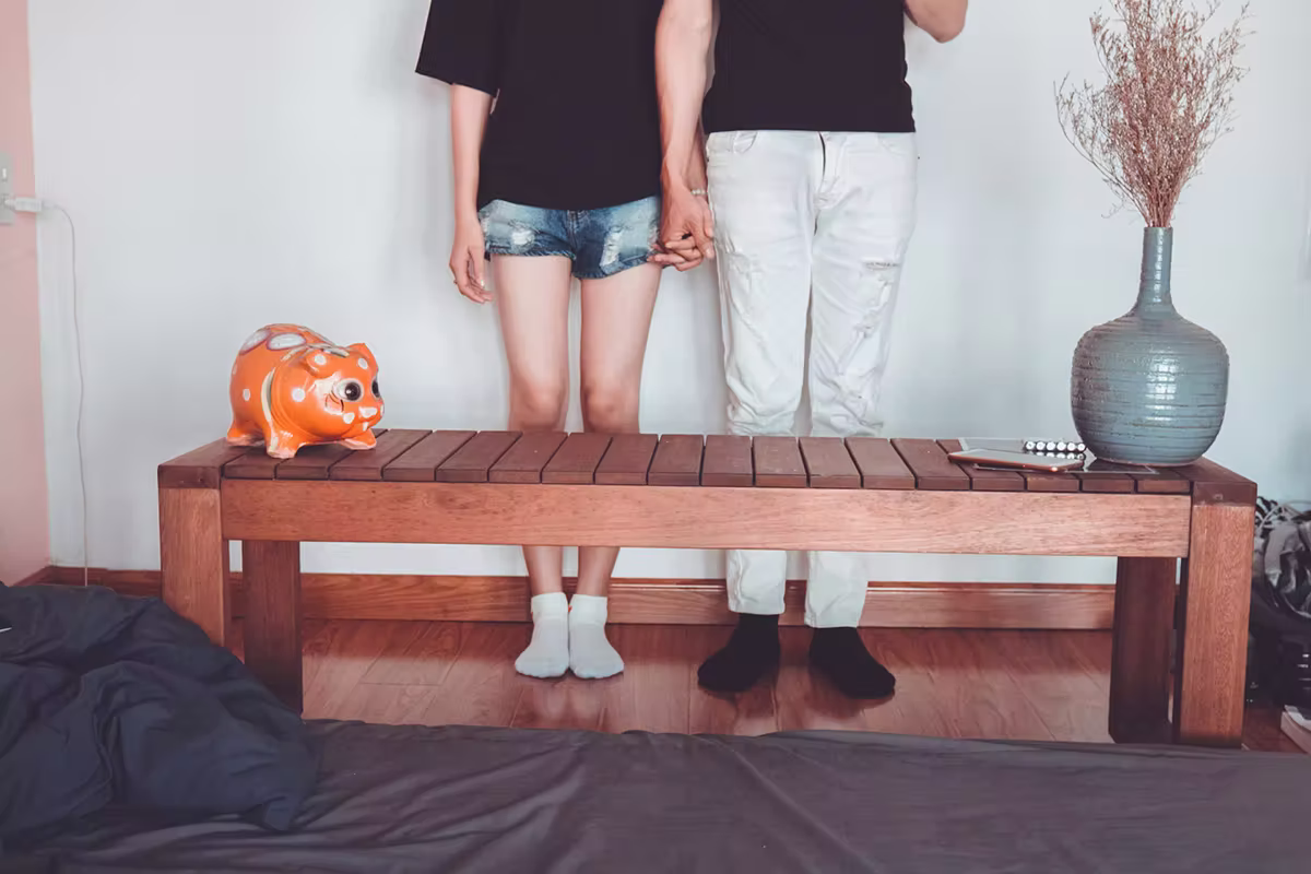 How To Manage Your Qnet Earnings 2 Couple holding hands in front of their furniture which they bought from wisely managing their QNET earnings