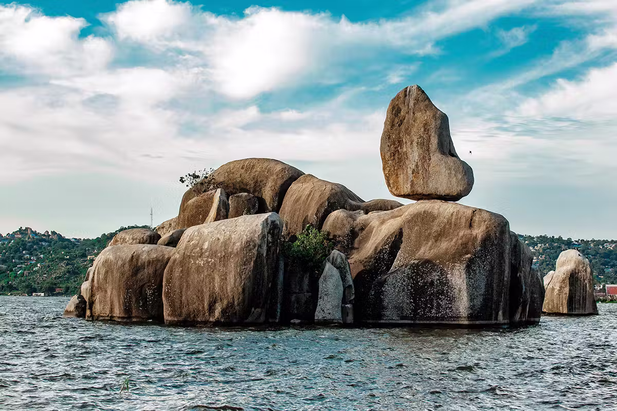 Five Must-Visit Lake Destinations For Your Travel Bucket List 4 Rock formations in one of the best lakes to visit around the world, Lake Victoria in Africa.